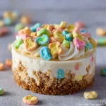 No-Bake Lucky Charms Cheesecake topped with colorful marshmallows
