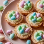 Colorful sugar cookie Easter egg nests filled with candy